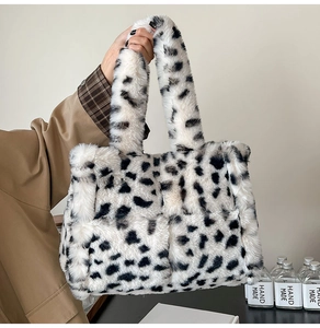Detailed macro view of high-quality faux fur leopard print tote bag with soft plush texture