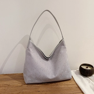 Elegant purple rhinestone hobo bag with glittering crystals and slim shoulder strap