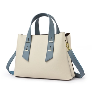 Minimalist large-capacity tote bag in beige and blue textured leather with shoulder strap
