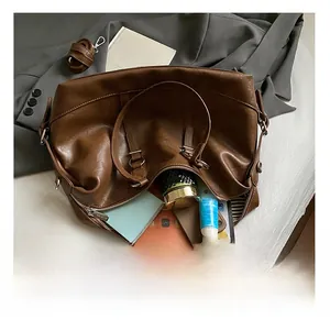 Large capacity tote bag interior with striped lining showing spacious storage space
