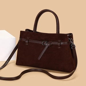 Large dark brown suede tote bag with smooth leather trim and adjustable shoulder strap