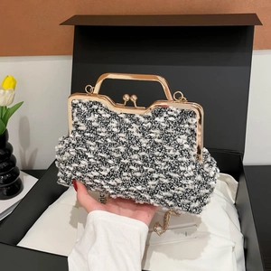Classic black and white tweed evening clutch with gold metal frame in a gift box