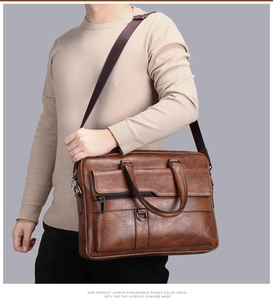 Brown vintage leather briefcase with double handles and adjustable shoulder strap for men