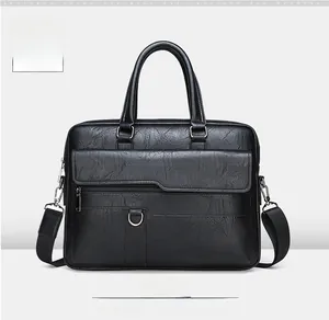 Detail of black lychee grain leather briefcase with magnetic flap and D-ring buckle