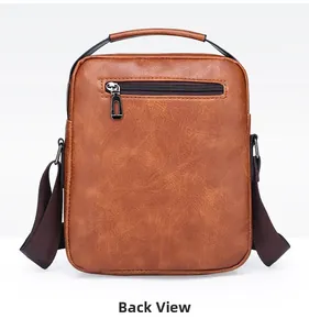 Back view of brown vintage men's messenger bag with metal zipper and top handle