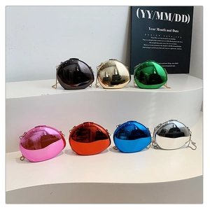 Polished pebble-shaped evening bags in seven metallic colors with gold chain straps