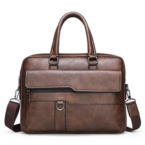 Dark brown leather briefcase for men featuring a top handle and adjustable shoulder strap