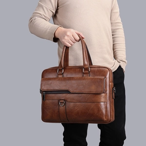 Men's brown leather business briefcase with handle and front pockets in professional style