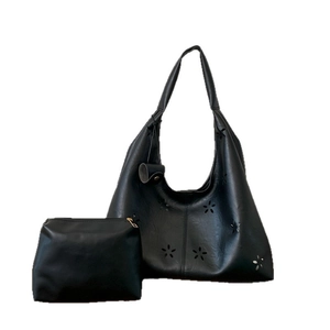 Retro black leather tote set with laser-cut floral patterns and small matching pouch