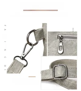 Detail of dark gunmetal hardware and grey fabric texture on retro shoulder bag