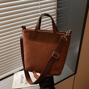 Vintage brown tote bag in matte suede with leather handles and wide fabric strap for commuting