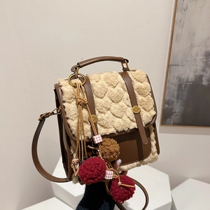 Retro plush backpack with heart pattern and pom-pom charm for autumn winter fashion