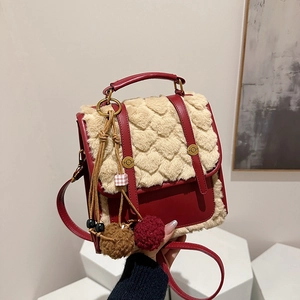 Vintage red leather and heart pattern plush crossbody backpack with stylish fuzzy charms