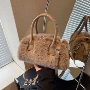 Brown faux fur plush boston bag with leather handles and crossbody strap for autumn winter
