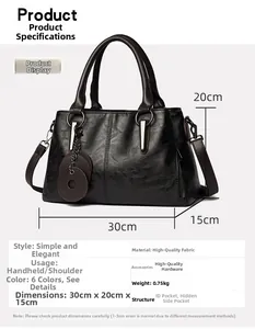 Detail view of black vintage tote bag with dimensions 30x20x15cm and silver hardware