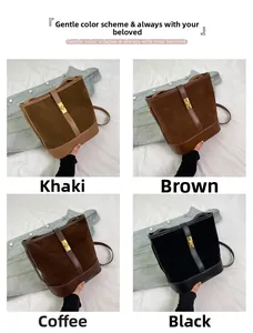 Detail view of suede patchwork bucket bags in khaki brown coffee and black colors