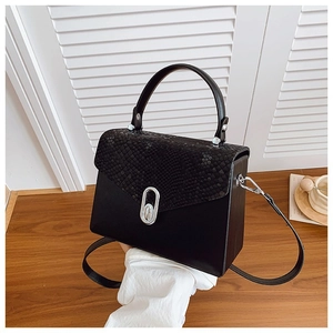 Black PU leather handbag with snakeskin pattern flap and silver oval metal buckle