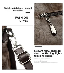 Detail of dark brown leather tote showing metal zipper and adjustable shoulder strap