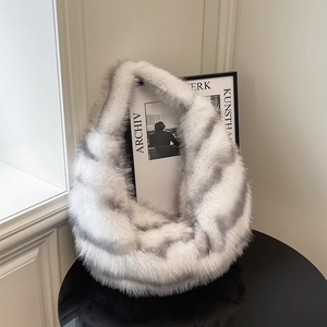 Plush faux fur snood scarf with grey wavy patterns on white background for winter