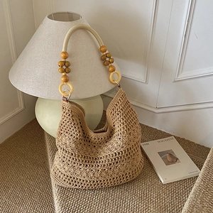 Bohemian hollow-out woven tote bag with wooden beads and vintage crochet floral texture