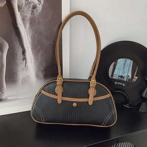 Retro black woven handbag with brown leather straps and gold metal clasp decoration