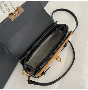 Innenansicht der Tasche mit drei Fächern und einem mittleren Reißverschlussfach in Gelb-Schwarz