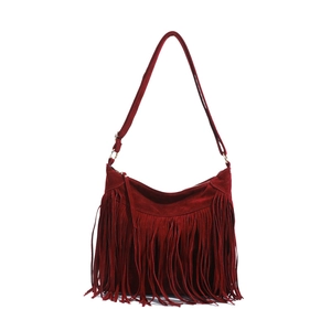 Detail of burgundy faux suede fringe bag featuring long tassels and zipper closure
