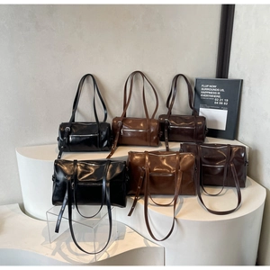 Multiple styles of retro PU leather Boston and tote bags in black, brown and coffee colors