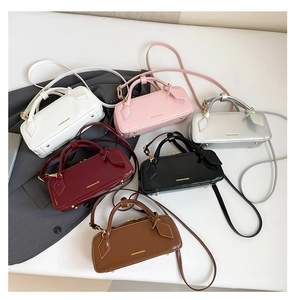 Collection of minimalist faux leather baguette bags in six colors with gold hardware