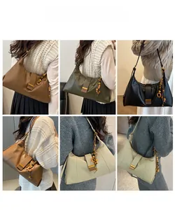 Detailed views of vintage faux leather shoulder bags in six various colors with wooden bead charms