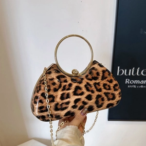 Chic leopard print clutch bag with gold round handle and chain strap for women
