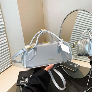 Silver retro baguette Boston bag with gold hardware and fashion lettering design