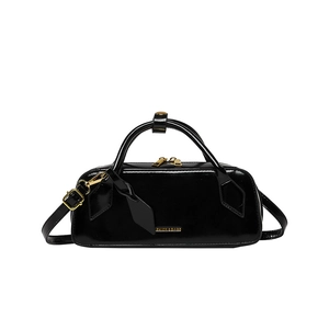 Vintage black patent leather baguette bag with gold hardware and top handles