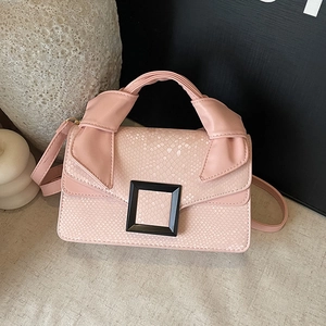 Pink stone patterned faux leather handbag with knot handle and black square buckle closure