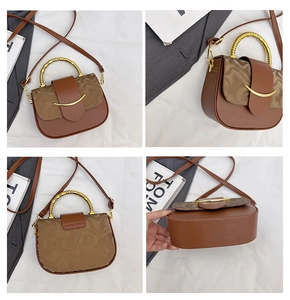 Detail view of brown patchwork square handbag with golden spiral handle and metal buckle