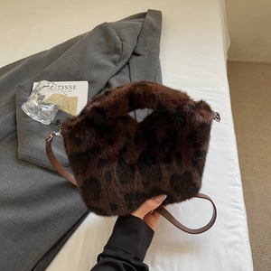 Retro faux fur leopard print tote bag with top handle and crossbody strap in soft brown tones