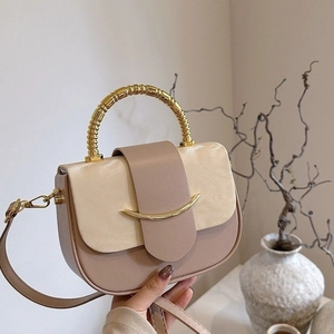 Chic two-tone square crossbody bag with bamboo metal handle and golden moon buckle