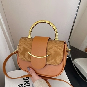 Vintage caramel box bag with gold bamboo handle and floral fabric flap for women