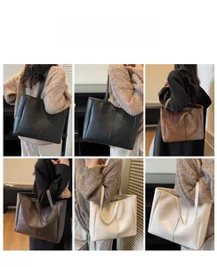 Viste multiple di borse tote grandi in nero, marrone e crema che mostrano lo stile a spalla