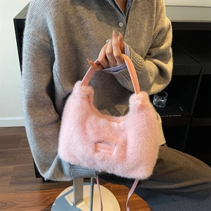 Chic pink plush handbag with 'Love Every Day' label for autumn and winter outfits