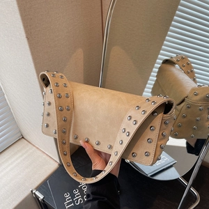 Chic light camel leather underarm bag with silver rivet studs and wide shoulder strap