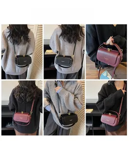 Detailed views of vintage quilted box bag in black and burgundy with metallic twist lock