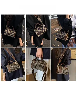 Outdoor lifestyle shot of vintage checkered bucket bag worn as a crossbody or handbag
