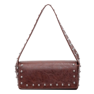 Brown vintage rivet shoulder bag with silver studs and premium leather texture on white background