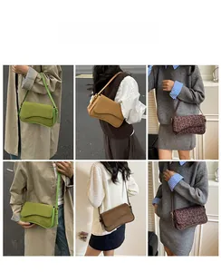 Close-up of stylish frosted suede shoulder bags in green, brown and leopard print