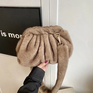 Minimalist beige plush crossbody cloud bag for women with golden metal hooks and wide strap