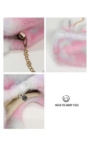 Detail of pink and blue plush bag showing soft faux fur texture and gold chain strap