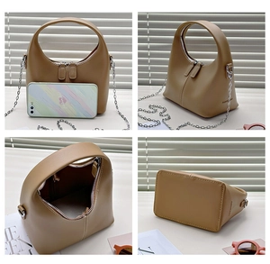 Detail views of khaki chain bag showing handle, dual zippers, interior and base