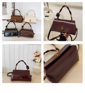 Detail view of glossy faux leather bags with golden metal buckle and woven handles