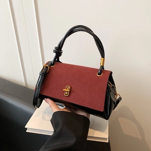 Retro two-tone handbag in burgundy suede and black leather with gold clasp